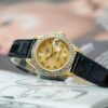 Đồng hồ Rolex Lady Datejust 69178 Mặt Số Tia Vàng Vành Kim Cương Tự Nhiên Cũ